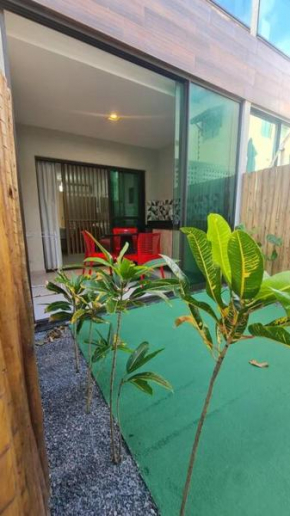 Flat Térreo 02 Jardim by LaPlaya